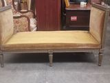 a couch that is sitting in the middle of a room