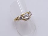 an image of a ring with three diamonds on it