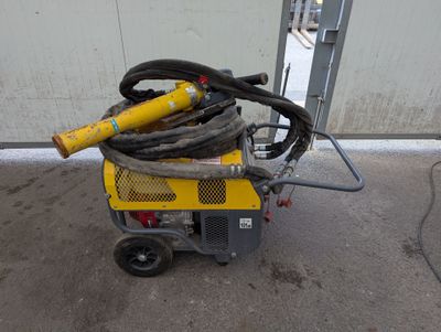 an image of a machine with a hose attached to it