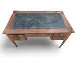 an old desk with a chalkboard on top of it
