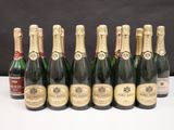 six bouteilles de champagne alignées sur une table