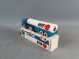 a toy truck that is sitting on top of a box
