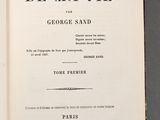 an open book with a black and white title on it
