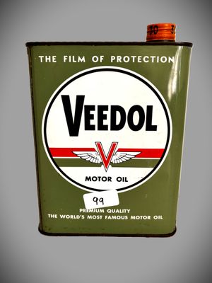 un vieux bidon d'huile moteur Veedol sur fond gris