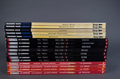 several books stacked on top of each other on a table