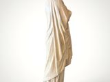 an image of a statue of a woman in a white robe