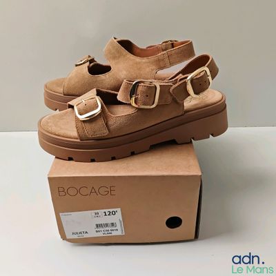the shoes are on the box and ready to be put into the box