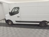 a picture of a white van parked in a garage