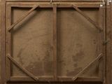 an old picture of a wooden frame with a window in the middle