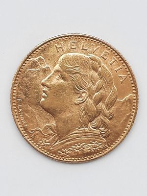l'image d'une pièce d'or sur laquelle figure le visage d'une femme