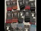 several pairs of men ' s socks sitting on top of each other