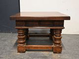 a small wooden table with a drawer on top of it