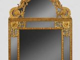 an image of a mirror with a gold frame on a white background