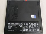 a close up of a laptop with a red sticker on it