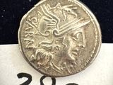 une vieille pièce de monnaie sur laquelle figure l'image d'un homme