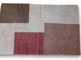 an image of a folded piece of fabric with different colors on it