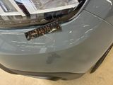 a close up of a car with a sticker on it