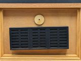 a small radio that is on display in a wooden box