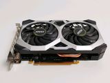 a close up of a video card with two fans on top of it
