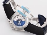 a close up of a watch on a white surface