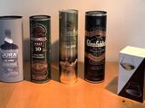 several different types of cans are lined up on a table