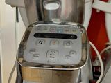 a blender sitting on top of a counter next to a blender
