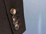 a close up of a man ' s jacket and tie