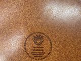 an image of a close up of a brown plate on a table