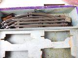 a box with a bunch of train tracks inside of it