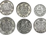 six different types of silver coins on a white background