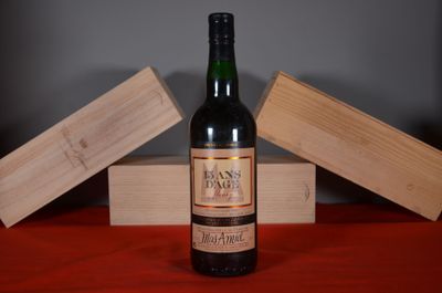 a bottle of wine that is sitting on a table