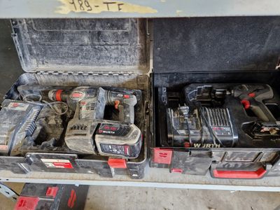two power tools in the case on the shelf