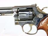 gun on a white surface with a white background and a white background