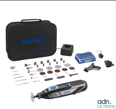 an image of a dremel kit with a case and tools