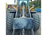 a tractor that is parked in the parking lot
