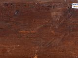 an image of a piece of wood with a sign on it