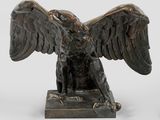 statue of an eagle on a pedestal with its wings spread