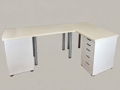 a computer desk with two drawers and a file cabinet