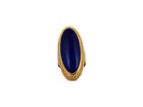 gros plan d'une bague en or avec une pierre bleue