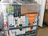 a large metal cage with a bunch of items inside of it