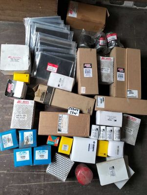 a pile of boxes and packages on the floor
