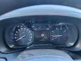 a close up of a car dashboard with a speedometer and gauges
