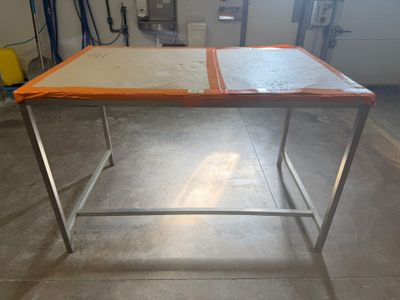 a table that is sitting in the middle of a room