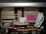 a display of jewelry on a table in a store