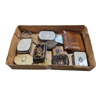 a box of assorted items sitting on a white surface