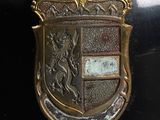 a picture of a sword and shield on a black surface