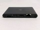 a close up of the back of a black computer with two usb ports