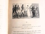 un livre ouvert sur lequel figure la photo d'un groupe de personnes