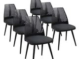 set of six black mesh chairs with black legs