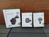 two boxes of xbox 360 accessories sitting on a wooden floor